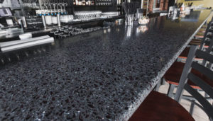black terrazzo countertop with a rounded edge profile