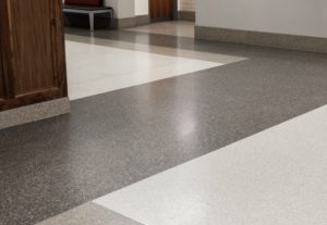 gray, white, and black terrazzo floor with terrazzo straight base
