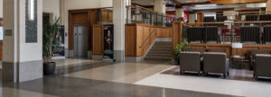 Beige, white, and black terrazzo floor and terrazzo column