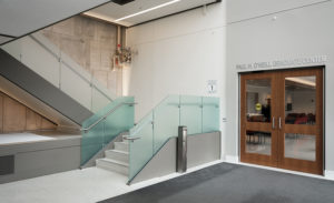 white terrazzo floor with terrazzo treads next to a doorway